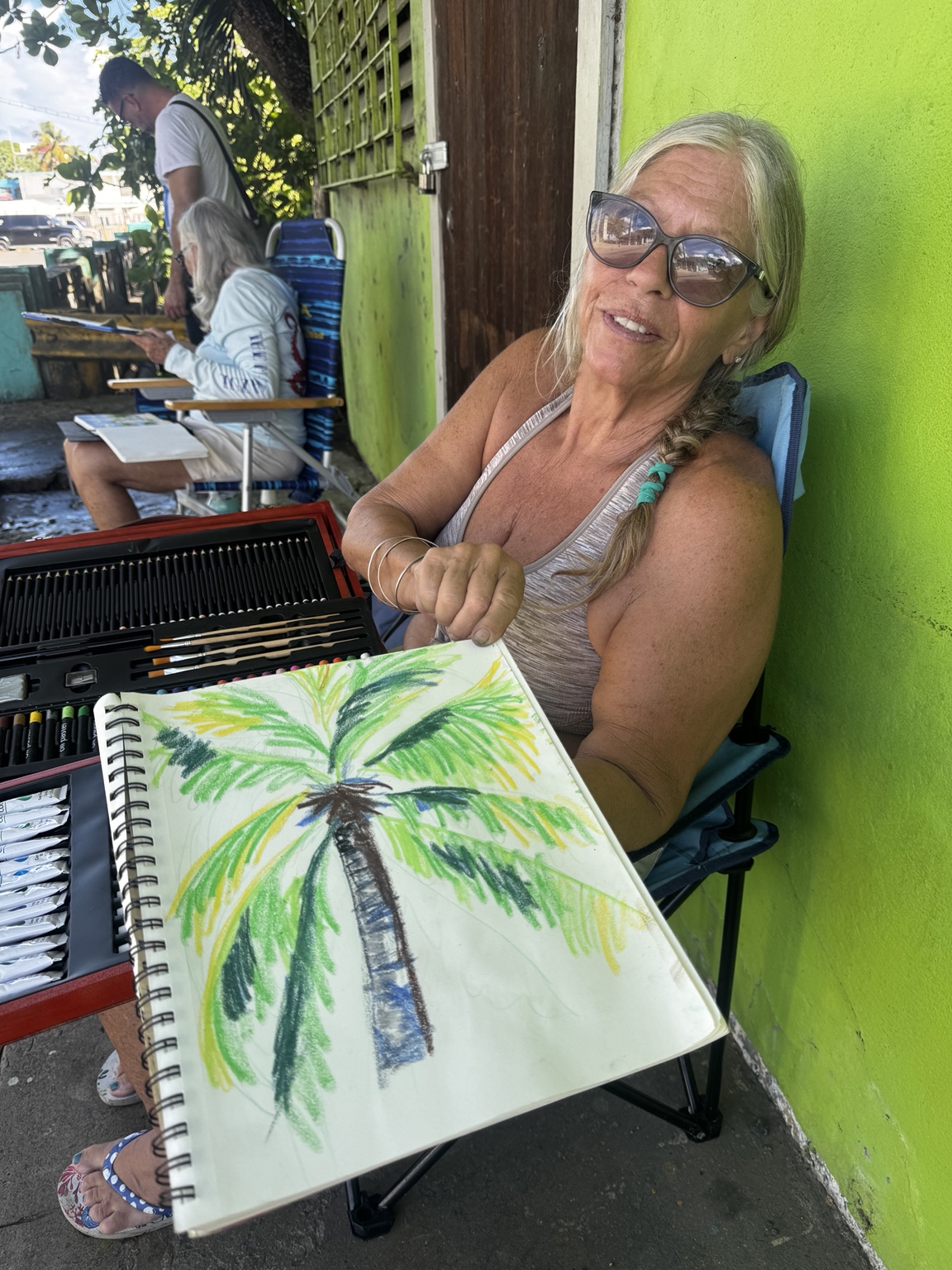 A participant shares her watercolor