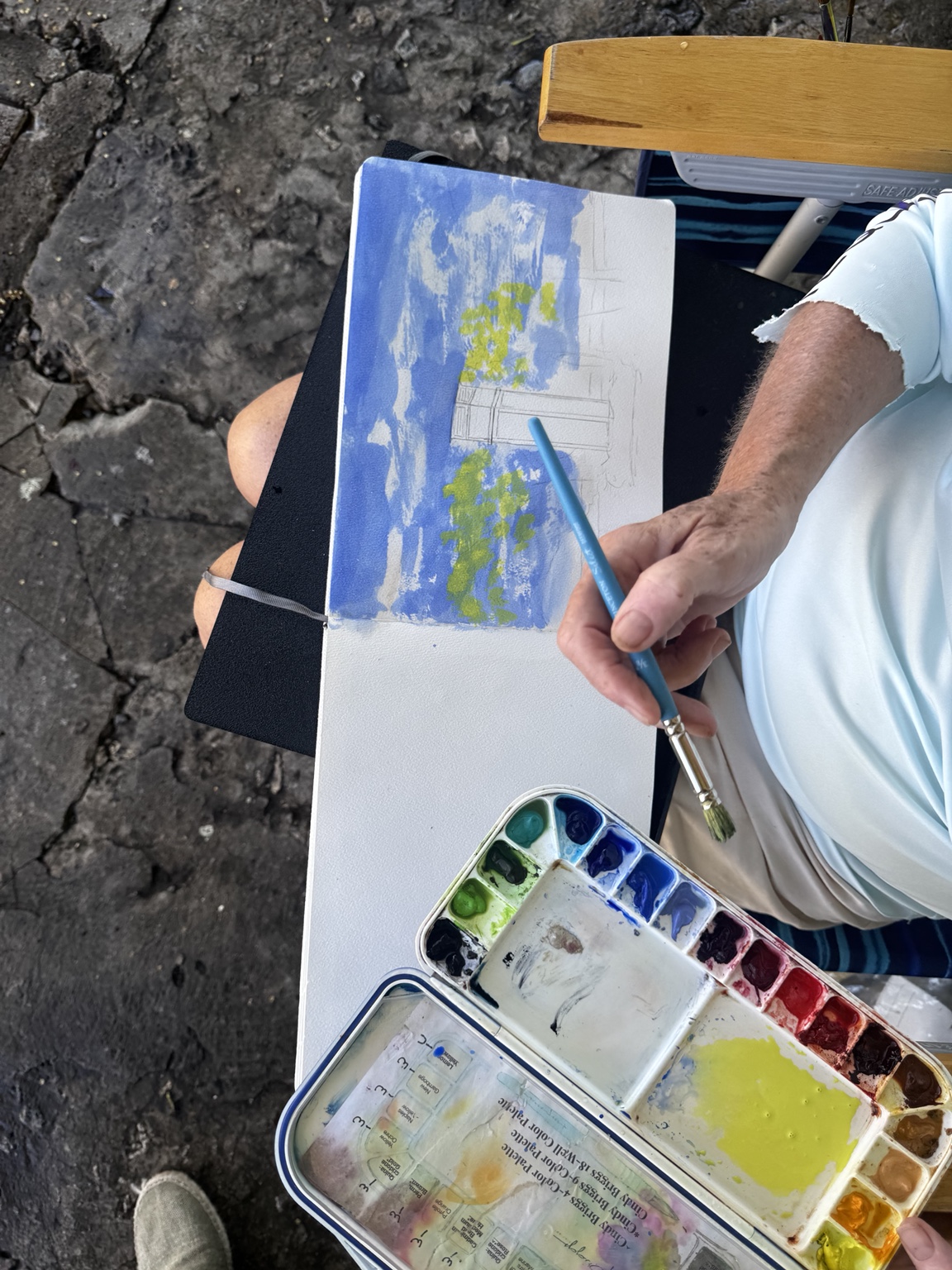 Watercolor painting in progress during the gathering
